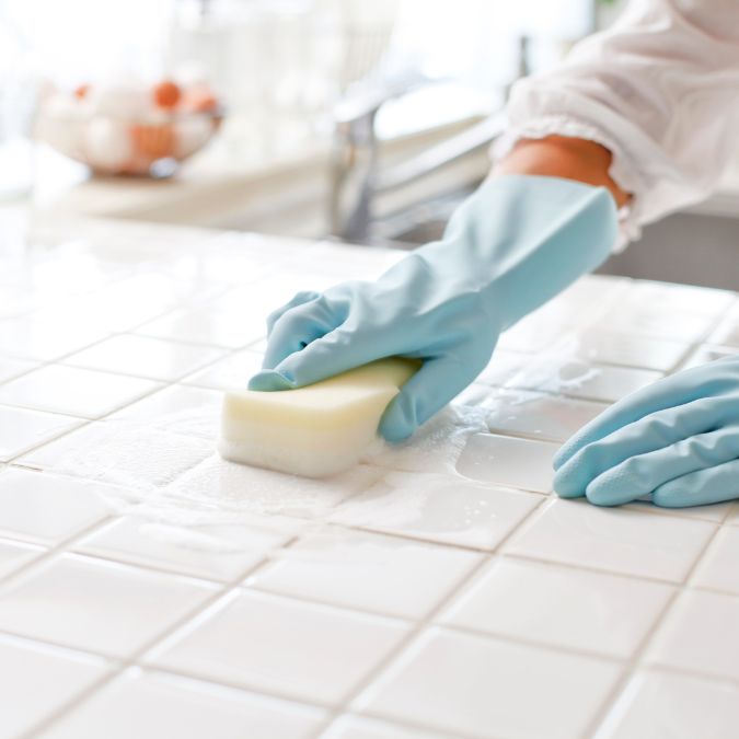 Person cleaning a vacation rental in Mazatlan.