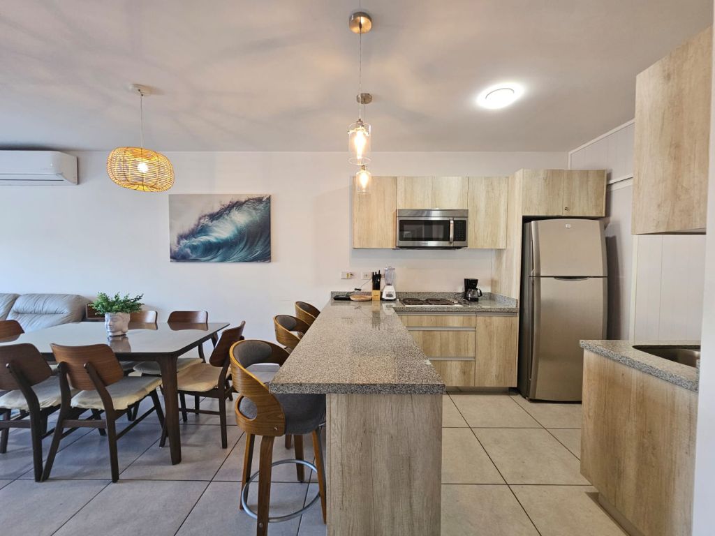 Palmilla contemporary kitchen and dining area.